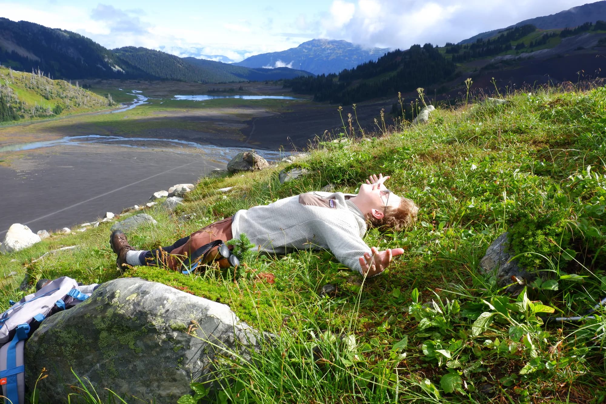 me laying in grass